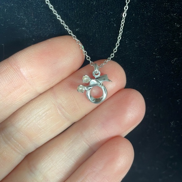 Elegant Silver Necklace with Bow Pendant - Picture 2 of 5